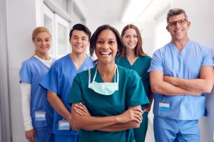 Diverse group of health care workers smiling